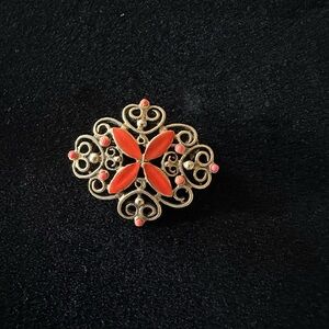 Gold and Orange Floral Brooch with Intricate Metalwork